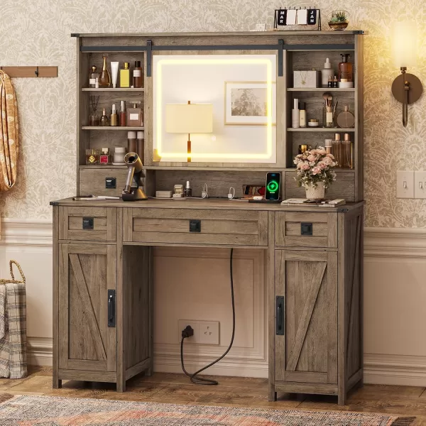 VIAGDO Farmhouse Vanity Desk with Sliding Mirror and Lights 47quot Barn Door Makeup Vanity with Charging Station ampamp 5 Drawers ampamp 2 Cabinets Large Makeup Desk Table with Hidden Shelves for BedroomAntique Oak