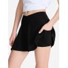 imageDEVOROPA Youth Girls Tennis Skirts Crossover Waist 2 in 1 Flowy Athletic Skorts with Pocket Golf Cheer School Shorts for KidsBlack