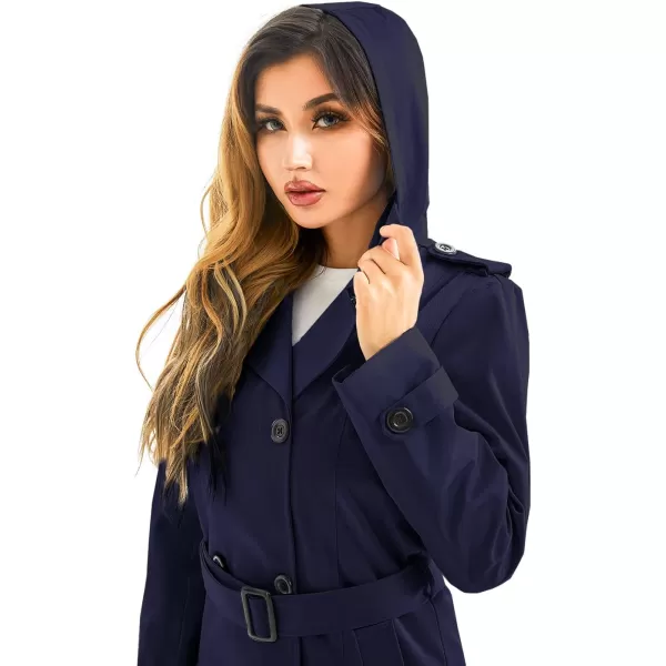 imageFARVALUE Womens Waterproof Trench Coat Long Double Breasted Windbreaker Classic Belted Lapel Overcoat with Removable HoodNavy