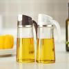 imageMarbrasse Auto Flip Olive Oil Dispenser Bottle20 OZ Leakproof Condiment Container With Automatic Cap and StopperNonDrip SpoutNonSlip Handle for Kitchen Cooking BrownWhite