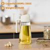 imageMarbrasse Auto Flip Olive Oil Dispenser Bottle20 OZ Leakproof Condiment Container With Automatic Cap and StopperNonDrip SpoutNonSlip Handle for Kitchen Cooking BrownBeige