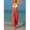 image:imageDokotoo Beach Pants for Womens Vacation Summer Outfits Smocked Waist Harem Boho Flowy Wide Leg Hippie Pants with PocketsOrange