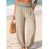 image:imageDokotoo Beach Pants for Womens Vacation Summer Outfits Smocked Waist Harem Boho Flowy Wide Leg Hippie Pants with PocketsParchment