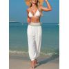image:imageDokotoo Beach Pants for Womens Vacation Summer Outfits Smocked Waist Harem Boho Flowy Wide Leg Hippie Pants with PocketsWhite
