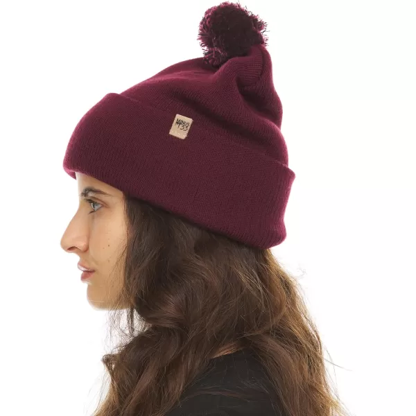 imageMinus33 Midweight Everyday Knit Cuff Pom Beanie  100 Merino Wool  Winter Pom Pom HatBurgundy With Black and Burgundy Pom