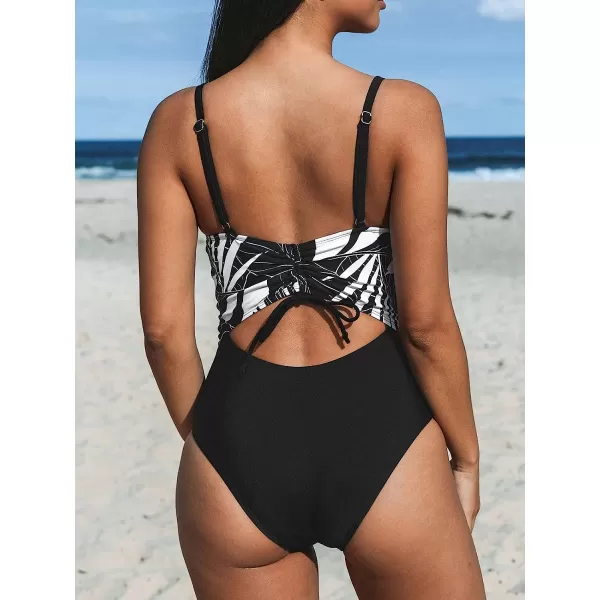 imageCUPSHE One Piece Swimsuit for Women Bathing Suit Cutout Tummy Control Back Drawstring Adjustable StrapsBlackTropical Leaf