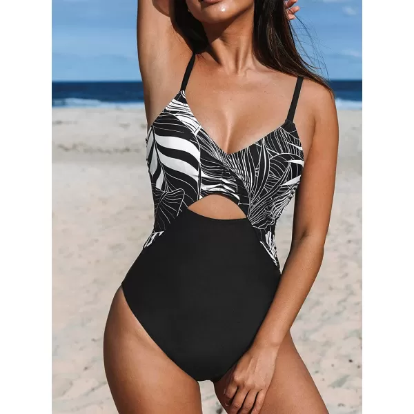 imageCUPSHE One Piece Swimsuit for Women Bathing Suit Cutout Tummy Control Back Drawstring Adjustable StrapsBlackTropical Leaf