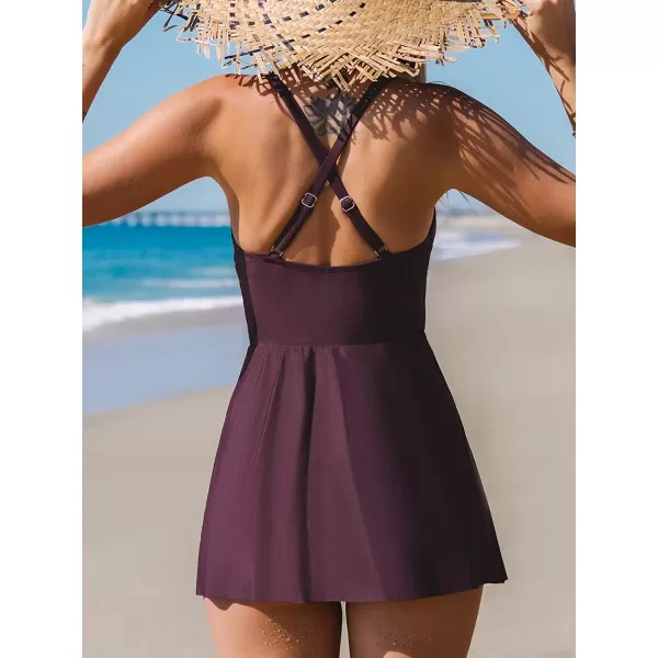 imageCUPSHE One Piece Swimsuit for Women Tummy Control Swim Dress Crisscross Ruched Skirted Bathing Suits with BottomBlackberry Wine