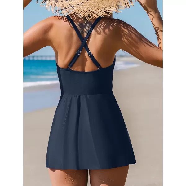 imageCUPSHE One Piece Swimsuit for Women Tummy Control Swim Dress Crisscross Ruched Skirted Bathing Suits with BottomNavy