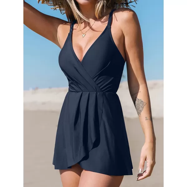 imageCUPSHE One Piece Swimsuit for Women Tummy Control Swim Dress Crisscross Ruched Skirted Bathing Suits with BottomNavy