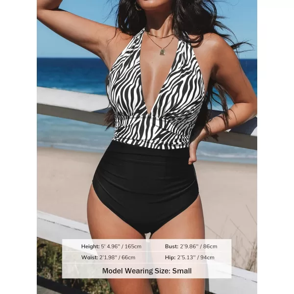 imageCUPSHE Women V Neck One Piece Swimsuit Halter Backless Ruched Tummy Control Bathing SuitBlackZebra Print