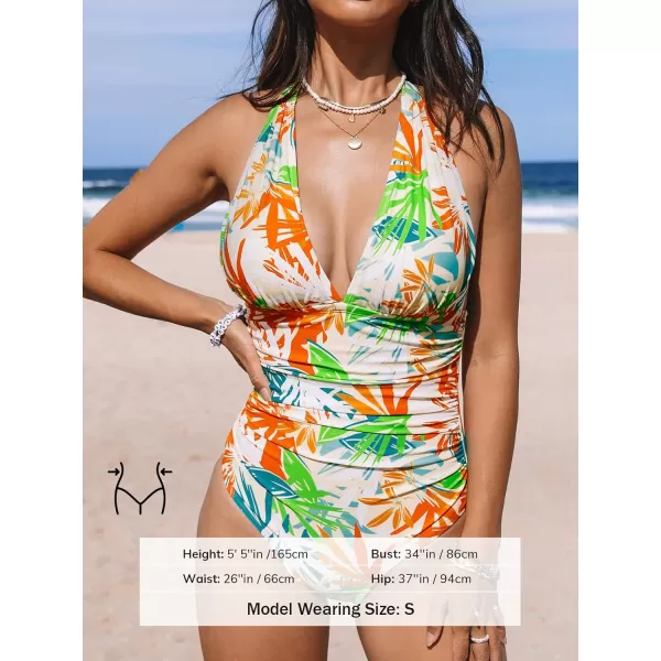 imageCUPSHE Women V Neck One Piece Swimsuit Halter Backless Ruched Tummy Control Bathing SuitOrangeGreenTropical