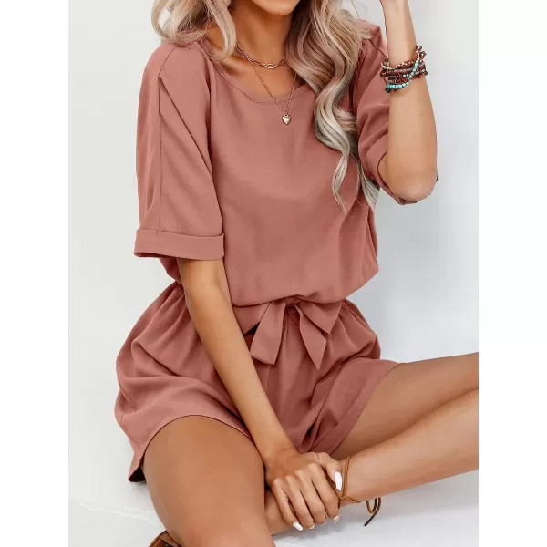 imageCUPSHE Womens Boat Neck Romper Short Sleeves Jumpsuit Empire Waist Belt Romper with Back CutoutPink
