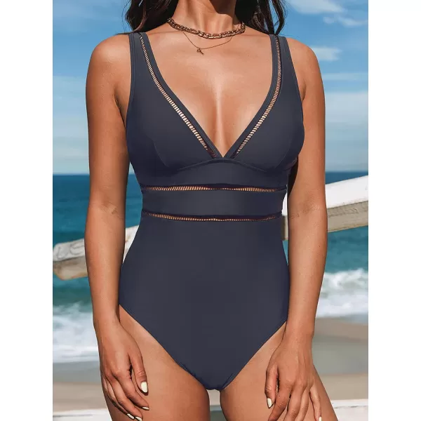 imageCUPSHE Womens One Piece Swimsuit V Neck Adjustable Wide Straps Ladder Trim Low BackDark Navy