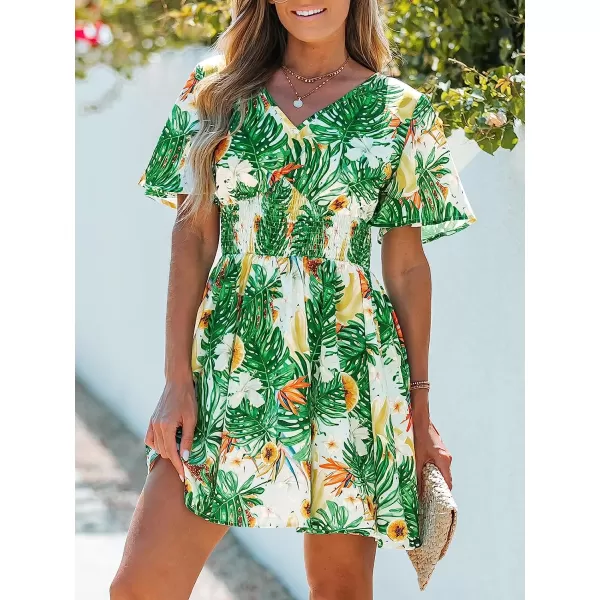 imageCUPSHE Womens V Neck Tropical Floral Print Smocked Short Sleeve Mini Dress Casual A Line Short DressGreen Leaf