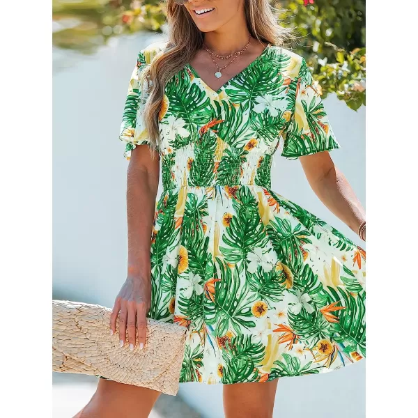 imageCUPSHE Womens V Neck Tropical Floral Print Smocked Short Sleeve Mini Dress Casual A Line Short DressGreen Leaf