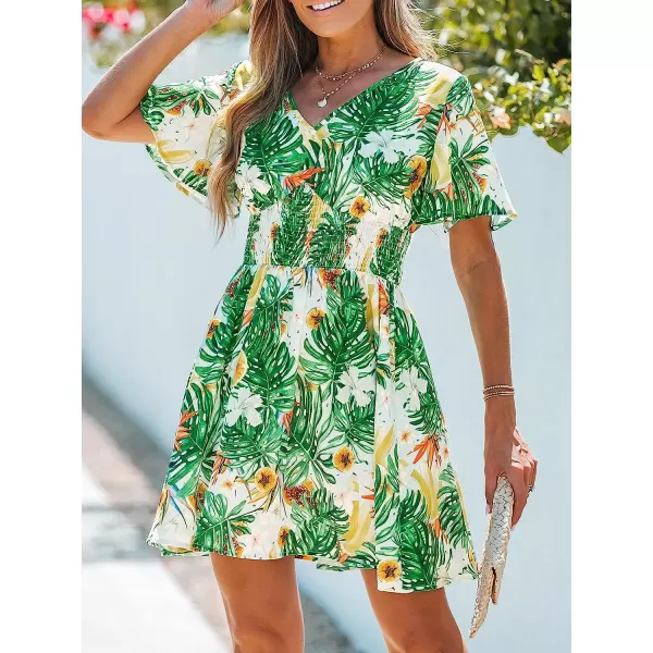 imageCUPSHE Womens V Neck Tropical Floral Print Smocked Short Sleeve Mini Dress Casual A Line Short DressGreen Leaf