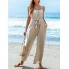 imageCUPSHE Womens Sleeveless Spaghetti Strap Scoop Neckline Sleeveless Waist Tie Wide Leg Jumpsuit Beach Vacation OutfitsBeige
