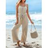 imageCUPSHE Womens Sleeveless Spaghetti Strap Scoop Neckline Sleeveless Waist Tie Wide Leg Jumpsuit Beach Vacation OutfitsBeige
