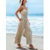 imageCUPSHE Womens Sleeveless Spaghetti Strap Scoop Neckline Sleeveless Waist Tie Wide Leg Jumpsuit Beach Vacation OutfitsBeige