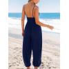 imageCUPSHE Womens Romper Woven Plunging V Neck Cami Straps Smocked Tapered Leg Jumpsuit Outfit Coverup Casual DressyNavy