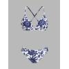 imageCUPSHE Bikini Set for Women Two Piece Swimsuits V Neck Low Rise Crisscross Back Self Tie Spaghetti StrapsWhiteNavy Blue Floral