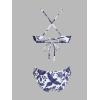 imageCUPSHE Bikini Set for Women Two Piece Swimsuits V Neck Low Rise Crisscross Back Self Tie Spaghetti StrapsWhiteNavy Blue Floral