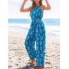 imageCUPSHE Womens Casual Loose Overalls Jumpsuits High Neck Sleeveless Wide Leg Boho One Piece Rompers With PocketsFloral Blue