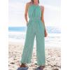 imageCUPSHE Womens Casual Loose Overalls Jumpsuits High Neck Sleeveless Wide Leg Boho One Piece Rompers With PocketsGreen