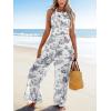 imageCUPSHE Womens Summer Jumpsuit Halter Casual Dressy Sleeveless One Piece Outfit Pockets Wide leg Pants RomperBlack Printed