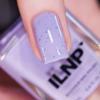 imageILNP Milk Tea  Pastel Orange Speckled Nail PolishLolly
