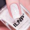 imageILNP Milk Tea  Pastel Orange Speckled Nail PolishSugar High