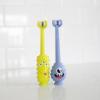 imageDr Browns ToothScrubber Toothbrush ThreeSided Toddler Training Toothbrush for Ages 14 Years with Suction Cup Base and Color Changing Bristles1 Pack  Green Monster