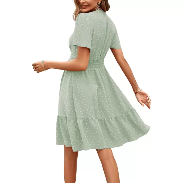 LYANER Women's V Neck Short Sleeve Mini Dress High Waist Cut Out Swiss Dot Short Dress Ruffle Hem Pom Pom Party Dress