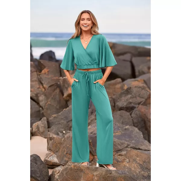 imagePRETTYGARDEN 2 Piece Outfits for Women 2023 Summer Short Sleeve Wrap V Neck Crop Tops Wide Leg Pants SetBean Green