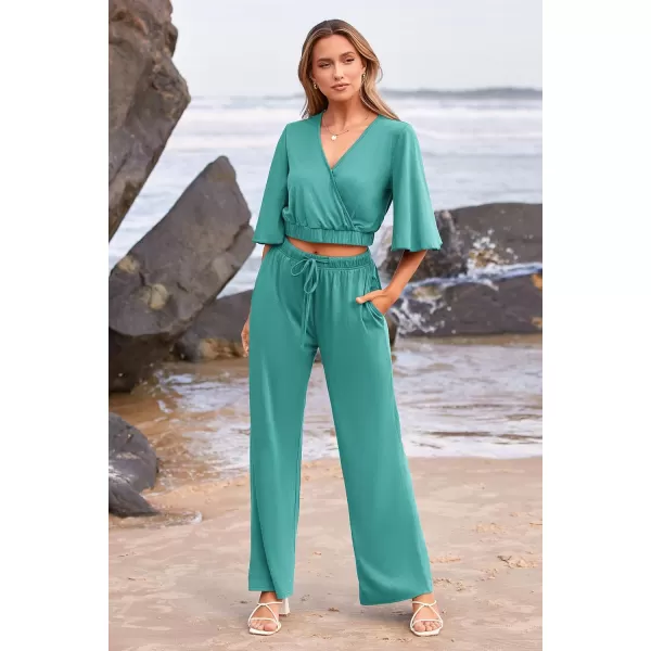imagePRETTYGARDEN 2 Piece Outfits for Women 2023 Summer Short Sleeve Wrap V Neck Crop Tops Wide Leg Pants SetBean Green