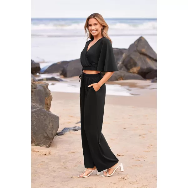 imagePRETTYGARDEN 2 Piece Outfits for Women 2023 Summer Short Sleeve Wrap V Neck Crop Tops Wide Leg Pants SetBlack
