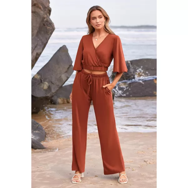 imagePRETTYGARDEN 2 Piece Outfits for Women 2023 Summer Short Sleeve Wrap V Neck Crop Tops Wide Leg Pants SetBrick Red