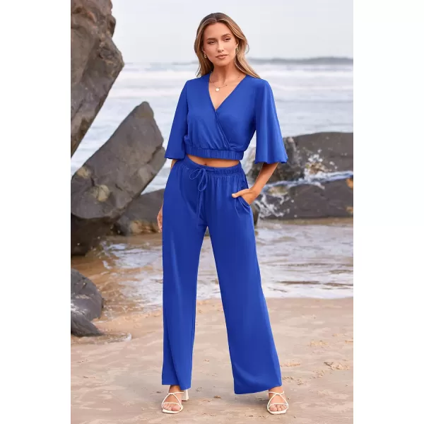 imagePRETTYGARDEN 2 Piece Outfits for Women 2023 Summer Short Sleeve Wrap V Neck Crop Tops Wide Leg Pants SetDark Blue