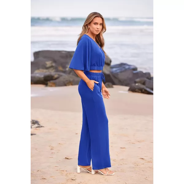 imagePRETTYGARDEN 2 Piece Outfits for Women 2023 Summer Short Sleeve Wrap V Neck Crop Tops Wide Leg Pants SetDark Blue