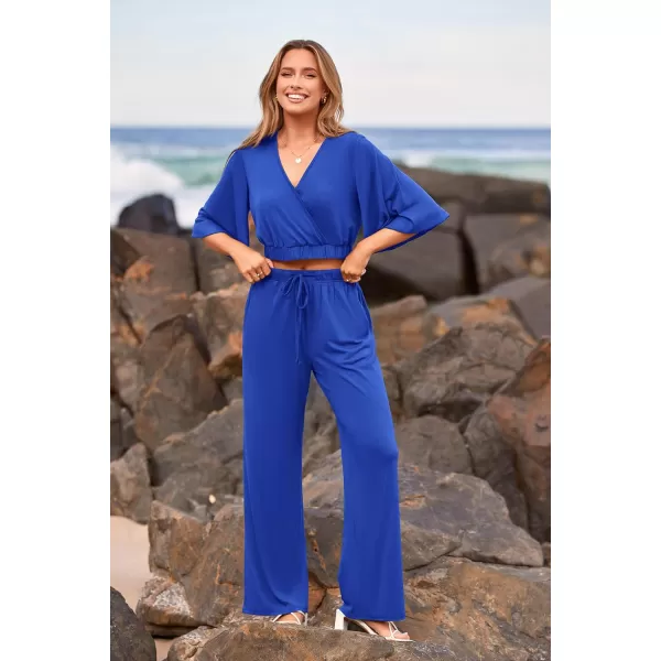 imagePRETTYGARDEN 2 Piece Outfits for Women 2023 Summer Short Sleeve Wrap V Neck Crop Tops Wide Leg Pants SetDark Blue