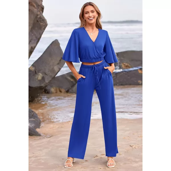 imagePRETTYGARDEN 2 Piece Outfits for Women 2023 Summer Short Sleeve Wrap V Neck Crop Tops Wide Leg Pants SetDark Blue