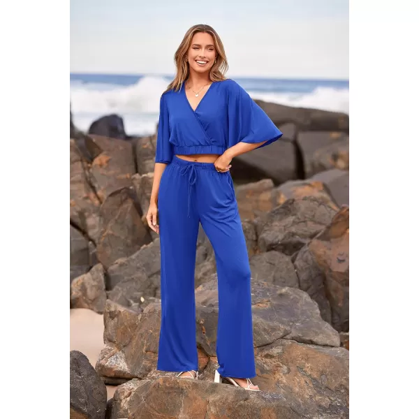 imagePRETTYGARDEN 2 Piece Outfits for Women 2023 Summer Short Sleeve Wrap V Neck Crop Tops Wide Leg Pants SetDark Blue