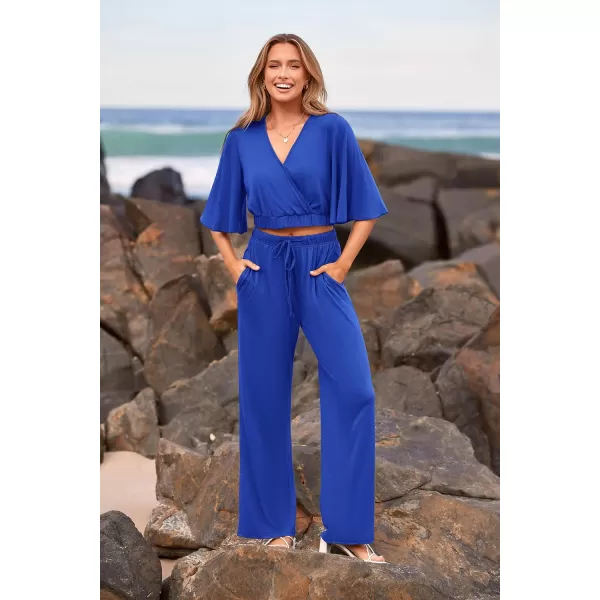 imagePRETTYGARDEN 2 Piece Outfits for Women 2023 Summer Short Sleeve Wrap V Neck Crop Tops Wide Leg Pants SetDark Blue