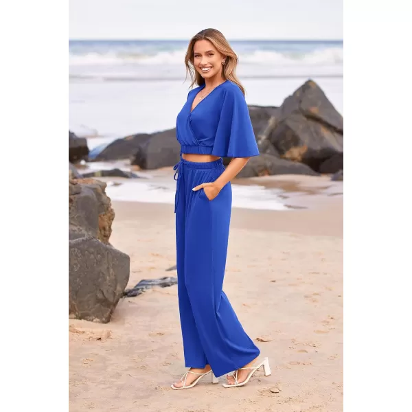 imagePRETTYGARDEN 2 Piece Outfits for Women 2023 Summer Short Sleeve Wrap V Neck Crop Tops Wide Leg Pants SetDark Blue