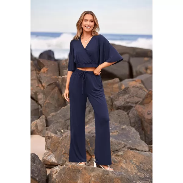 imagePRETTYGARDEN 2 Piece Outfits for Women 2023 Summer Short Sleeve Wrap V Neck Crop Tops Wide Leg Pants SetNavy