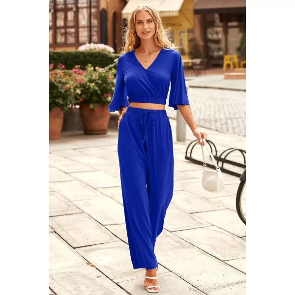 imagePRETTYGARDEN 2 Piece Outfits for Women 2023 Summer Short Sleeve Wrap V Neck Crop Tops Wide Leg Pants SetRoyal Blue