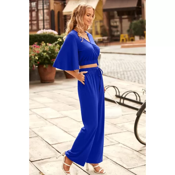 imagePRETTYGARDEN 2 Piece Outfits for Women 2023 Summer Short Sleeve Wrap V Neck Crop Tops Wide Leg Pants SetRoyal Blue