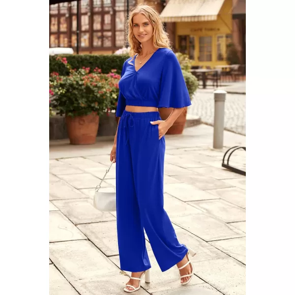 imagePRETTYGARDEN 2 Piece Outfits for Women 2023 Summer Short Sleeve Wrap V Neck Crop Tops Wide Leg Pants SetRoyal Blue