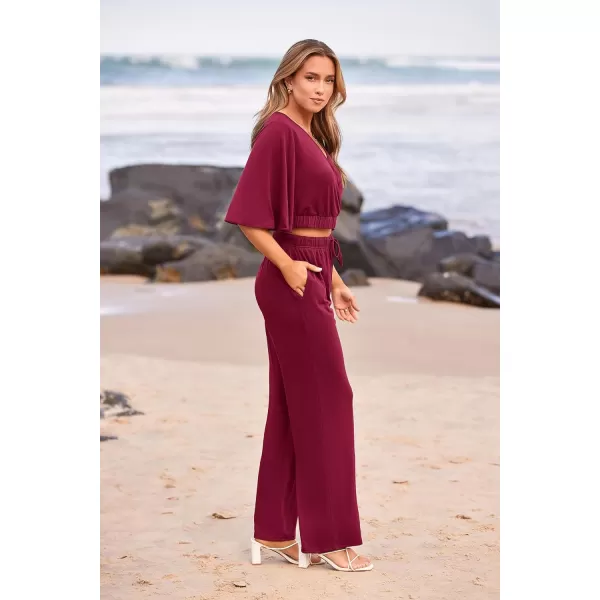 imagePRETTYGARDEN 2 Piece Outfits for Women 2023 Summer Short Sleeve Wrap V Neck Crop Tops Wide Leg Pants SetWine Red